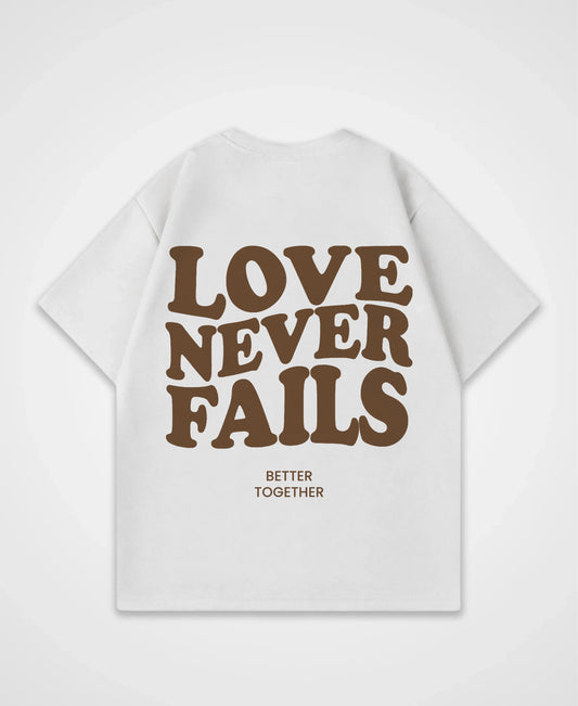 LOVE NEVER FAILS OVERSIZED SHIRT