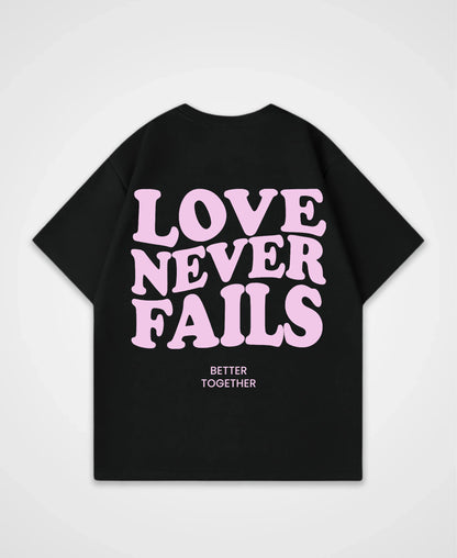 LOVE NEVER FAILS OVERSIZED SHIRT
