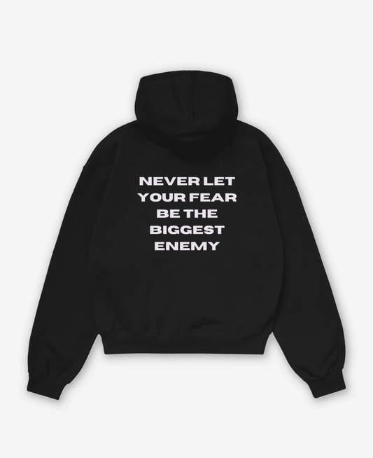 NEVER LET YOUR FEAR BE THE BIGGEST ENEMY OVERSIZED UNISEX HOODIE
