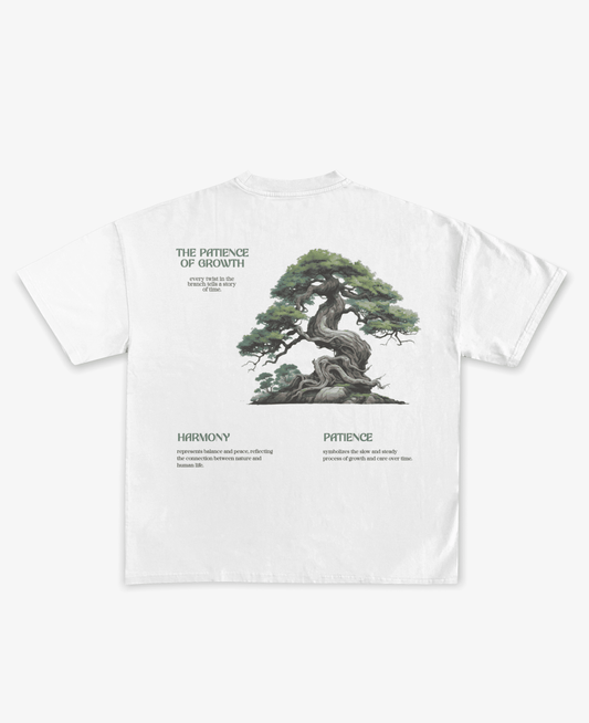 THE PATIENCE OF GROWTH OVERSIZED UNISEX T-SHIRT