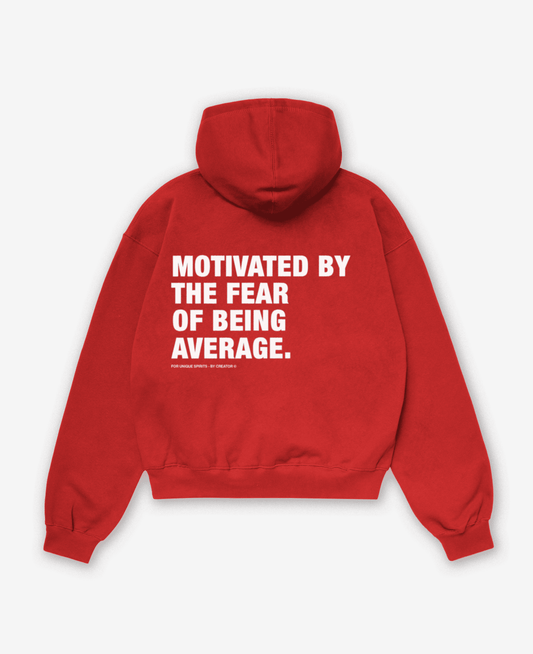 MOTIVATED BY THE FEAR OF BEING AVERAGE OVERSIZED UNISEX HOODIE
